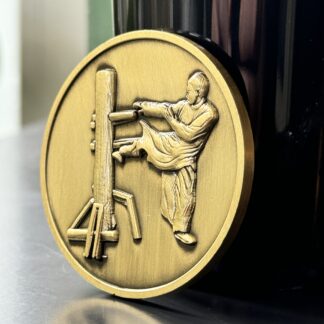 Gedenkmünze: Meister an der Holzpuppe